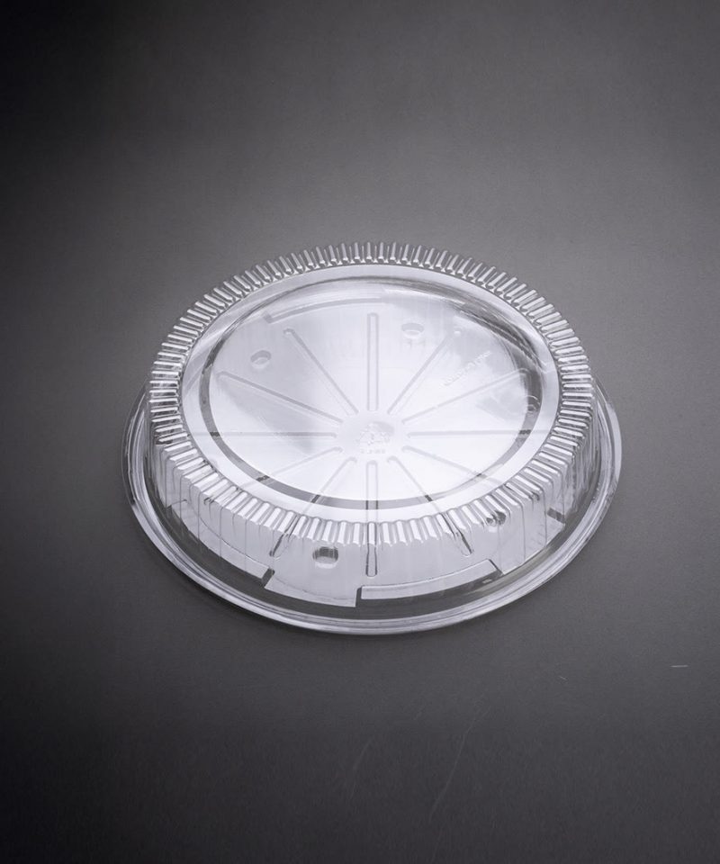 Clear round PET bakery lid made from recyclable plastic packaging, ideal for custom packaging of cakes, pastries, and sustainable food products.